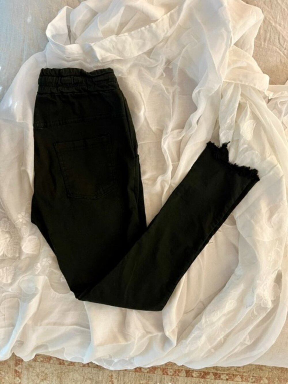Black Denim Stretch Pants with Raw Hem designed by Avery Rayne